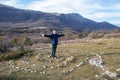 A smiling happy adult man on top of Paraguilmen Mountain.