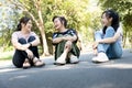 Smiling happy asian family spending good time at the park together,enjoying in outdoor summer nature,joyful grandmother,daughter Royalty Free Stock Photo