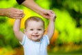 Smiling happy baby learning to walk