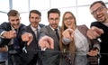 Entrepreneurs point their finger at you while sitting Royalty Free Stock Photo