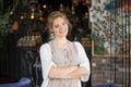 Smiling happy business woman posing at her own coffee shop Royalty Free Stock Photo