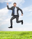 Smiling happy businessman jumping Royalty Free Stock Photo