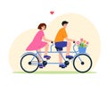 Smiling happy couple in love on tandem bycicle.