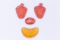 Candy face smile happy strawberry tangerine Royalty Free Stock Photo