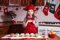 Festive red apron Christmas party dinner dessert peppermint cupcakes cheese cream sugar sprinkling decoration girl new