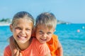 Smiling happy kids on the beach Royalty Free Stock Photo
