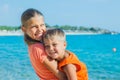 Smiling happy kids on the beach Royalty Free Stock Photo