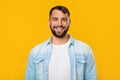Smiling happy mature european man looking at camera, isolated on yellow background, free space Royalty Free Stock Photo