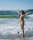 Smiling happy woman outdoor portrait, woman walking by the sea cost Royalty Free Stock Photo