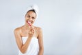 Smiling happy young woman with healthy teeth holding a tooth brush. Clean beauty and healthy concept Royalty Free Stock Photo