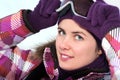 Smiling happy young woman wearing ski goggles Royalty Free Stock Photo