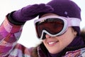 Smiling happy young woman wearing ski goggles Royalty Free Stock Photo