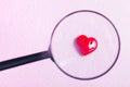 smiling heart on a hightech background and magnifier Royalty Free Stock Photo