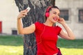 Smiling hipster beautiful girl listening to music Royalty Free Stock Photo