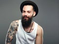 Smiling Hipster boy.handsome man in hat Royalty Free Stock Photo