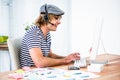 Smiling hipster businessman using headset Royalty Free Stock Photo