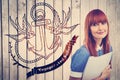 Composite image of smiling hipster woman holding document Royalty Free Stock Photo