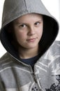 Smiling hooded teenage boy