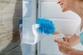 Smiling housewife making refrigerator clean Royalty Free Stock Photo