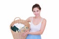 Smiling housewife posing with basket isolated white background. Royalty Free Stock Photo