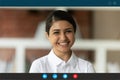 Smiling Indian woman talk on video call at home Royalty Free Stock Photo