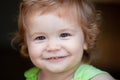 Smiling infant, cute smile. Kids baby macro portrait, close up head of cute child.