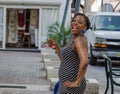 Smiling Island Woman Shopping - St. Maarten