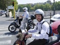 Smiling Italian man on the scooter Royalty Free Stock Photo