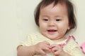 Smiling Japanese baby girl Royalty Free Stock Photo