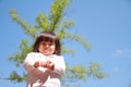 Smiling Japanese girl under the blue sky Royalty Free Stock Photo