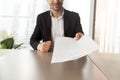 Smiling job applicant handing over resume to recruiter during in Royalty Free Stock Photo