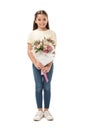 smiling kid with bouquet of flowers looking at camera Royalty Free Stock Photo