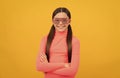 smiling kid in glamour party eyeglasses on yellow background, fancy look