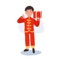 Smiling Kid in Oriental Costume Giving Thumbs Up and holding Gift box