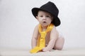 Smiling kid in a retro hat and tie on a white background Royalty Free Stock Photo