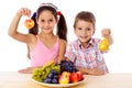 Kids with plate of fruit