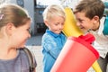 Woman and kids at enrolment day with school cones Royalty Free Stock Photo