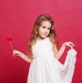 Smiling kif girl holding valentines heart Royalty Free Stock Photo