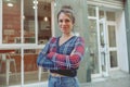 Portrait of happy woman standing near cafe Royalty Free Stock Photo