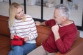 Smiling lady with present from her husband stock photo