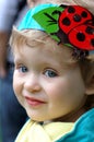 Smiling ladybird girl Royalty Free Stock Photo