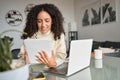 Smiling latin girl student using digital tablet elearning at home. Royalty Free Stock Photo