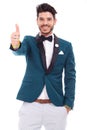 Smiling latin man looking and showing ok sign Royalty Free Stock Photo