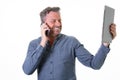 Smiling laughing handsome man talking on phone looking tablet computer screen isolated on white background