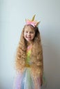 Smiling little beautiful cute girl with long blond hair Royalty Free Stock Photo