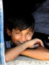 Smiling little boy in Dharavi slum Mumbai.