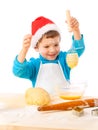 Smiling little boy with egg-beater Royalty Free Stock Photo