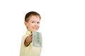 Smiling little boy giving money bill 100 us dollars isolated on Royalty Free Stock Photo