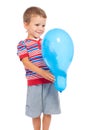 Smiling little boy holding the balloon Royalty Free Stock Photo