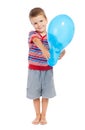 Smiling little boy holding the balloon Royalty Free Stock Photo